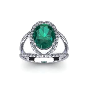1 1/2 Carat Oval Shape Emerald and Halo Diamond Ring In 14 Karat White Gold
