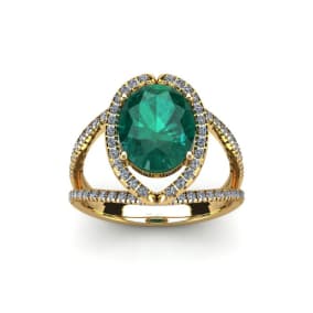 1 1/2 Carat Oval Shape Emerald and Halo Diamond Ring In 14 Karat Yellow Gold
