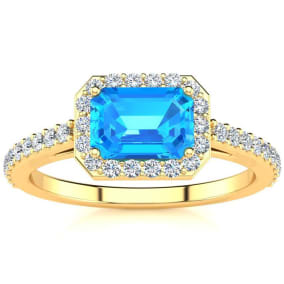1 1/2 Carat Blue Topaz and Halo Diamond Ring In 14 Karat Yellow Gold