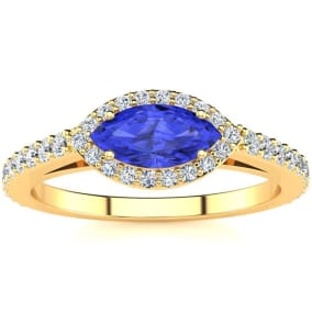 3/4 Carat Marquise Shape Tanzanite and Halo Diamond Ring In 14 Karat Yellow Gold