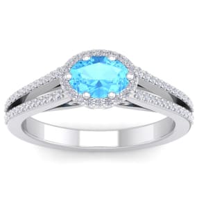 1 1/2 Carat Oval Shape Antique Blue Topaz and Halo Diamond Ring In 14 Karat White Gold