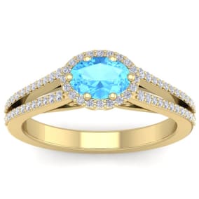 1 1/2 Carat Oval Shape Antique Blue Topaz and Halo Diamond Ring In 14 Karat Yellow Gold