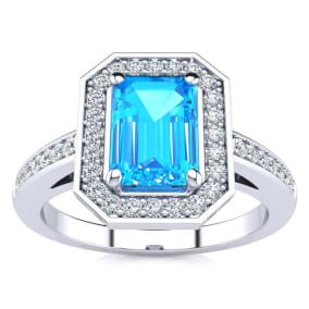 1 1/2 Carat Blue Topaz and Halo Diamond Ring In 14 Karat White Gold