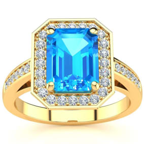 3 Carat Blue Topaz and Halo Diamond Ring In 14 Karat Yellow Gold