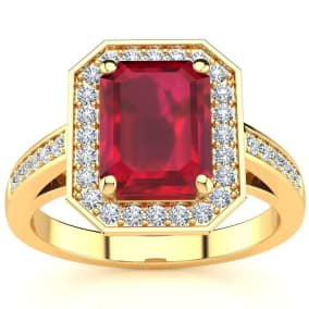 3 1/3 Carat Ruby and Halo Diamond Ring In 14 Karat Yellow Gold
