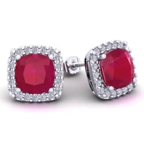 6 3/4 Carat Cushion Cut Ruby and Halo Diamond Stud Earrings In 14 Karat White Gold