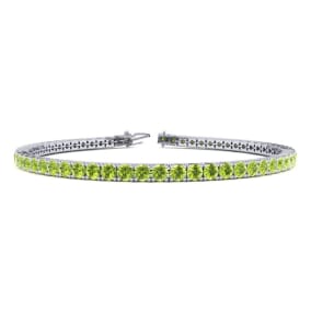 3 1/2 Carat Peridot Tennis Bracelet In 10K White Gold Available In 6-9 Inch Lengths
