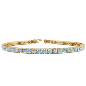 3 1/2 Carat Aquamarine And Diamond Graduated Tennis Bracelet In 14 Karat Yellow Gold, 6 1/2 Inches