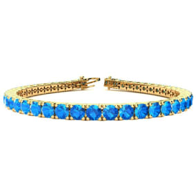 12 1/4 Carat Blue Topaz Tennis Bracelet In 14 Karat Yellow Gold Available In 6-9 Inch Lengths