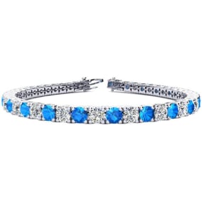 11 Carat Blue Topaz and Diamond Tennis Bracelet In 14 Karat White Gold Available In 6-9 Inch Lengths