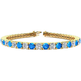 11 Carat Blue Topaz and Diamond Tennis Bracelet In 14 Karat Yellow Gold Available In 6-9 Inch Lengths