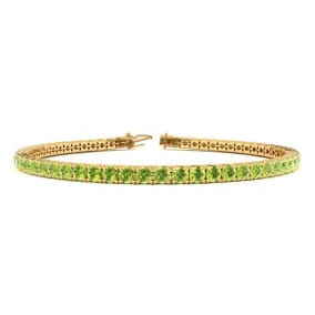 4 1/4 Carat Peridot Tennis Bracelet In 14 Karat Yellow Gold Available In 6-9 Inch Lengths