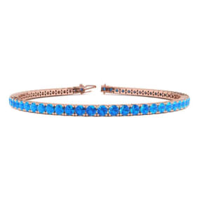 5 1/2 Carat Blue Topaz Tennis Bracelet In 14 Karat Rose Gold Available In 6-9 Inch Lengths