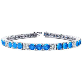 10 1/4 Carat Blue Topaz and Diamond Alternating Tennis Bracelet In 14 Karat White Gold, 6 1/2 Inches