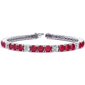 Ruby Bracelet; Ruby Tennis Bracelet; 12 1/3 Carat Ruby and Diamond Graduated Tennis Bracelet In 14 Karat White Gold