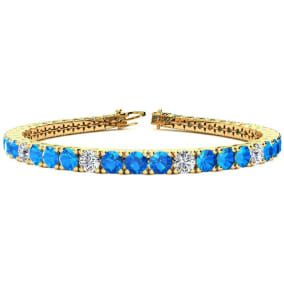 11 2/3 Carat Blue Topaz and Diamond Graduated Tennis Bracelet In 14 Karat Yellow Gold Available In 6-9 Inch Lengths