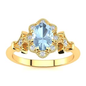 1 Carat Oval Shape Aquamarine and Halo Diamond Vintage Ring In 14 Karat Yellow Gold
