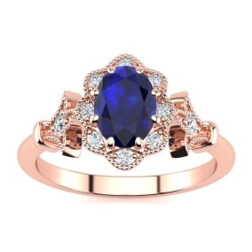 1 Carat Oval Shape Sapphire and Halo Diamond Vintage Ring In 14 Karat Rose Gold