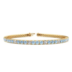 2 3/4 Carat Aquamarine And Diamond Alternating Tennis Bracelet In 14 Karat Yellow Gold, 7 1/2 Inches