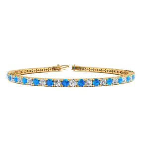 3 1/3 Carat Blue Topaz And Diamond Tennis Bracelet In 14 Karat Yellow Gold, 7 Inches
