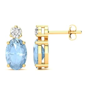 1 Carat Oval Aquamarine and Diamond Stud Earrings In 14 Karat Yellow Gold