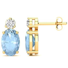 1 2/3 Carat Oval Aquamarine and Diamond Stud Earrings In 14 Karat Yellow Gold