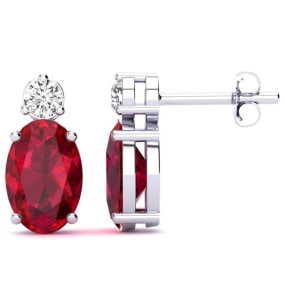 2 Carat Oval Ruby and Diamond Stud Earrings In 14 Karat White Gold