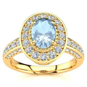 1 1/2 Carat Oval Shape Aquamarine and Halo Diamond Ring In 14 Karat Yellow Gold