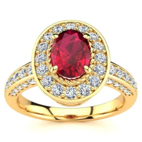 1 1/2 Carat Oval Shape Ruby and Halo Diamond Ring In 14 Karat Yellow Gold