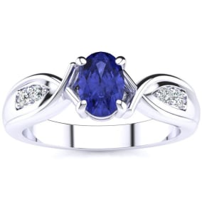 1 Carat Oval Shape Tanzanite and Four Diamond Ring In 10 Karat White Gold