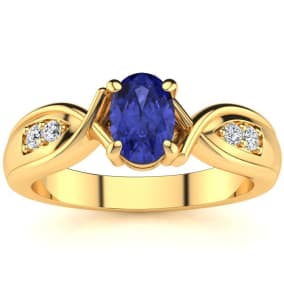 1 Carat Oval Shape Tanzanite and Four Diamond Ring In 10 Karat Yellow Gold