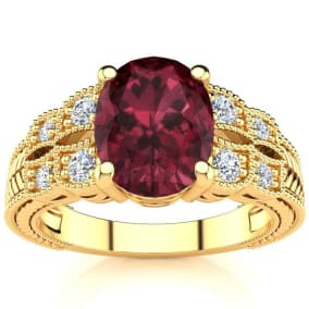 2 Carat Oval Shape Garnet and Diamond Ring In 10 Karat Yellow Gold