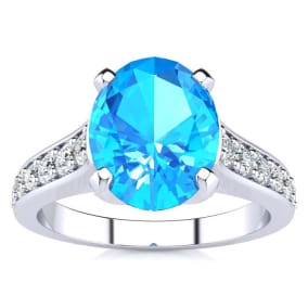 2 1/2 Carat Oval Shape Blue Topaz and Diamond Ring In 14 Karat White Gold