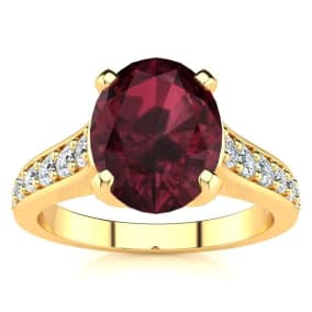2 1/3 Carat Oval Shape Garnet and Diamond Ring In 14 Karat Yellow Gold