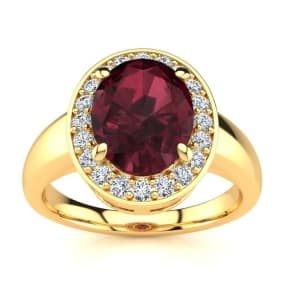 2 1/5 Carat Oval Shape Garnet and Halo Diamond Ring In 14 Karat Yellow Gold