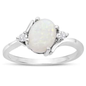 7/8 Carat Opal Ring and Two Diamonds In 14 Karat White Gold