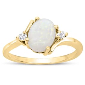 7/8 Carat Opal Ring and Two Diamonds In 14 Karat Yellow Gold