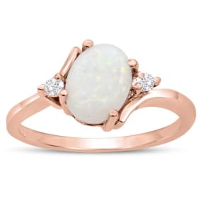 7/8 Carat Opal Ring and Two Diamonds In 14 Karat Rose Gold