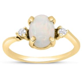 7/8 Carat Opal Ring and Two Diamonds In 14 Karat Yellow Gold