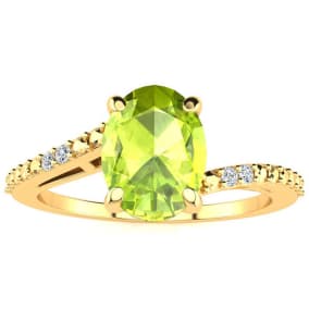 1 1/3ct Oval Shape Peridot and Diamond Ring in 10k Yellow Gold