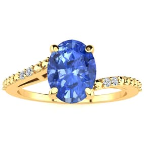 1 1/3ct Oval Shape Tanzanite and Diamond Ring in 10k Yellow Gold