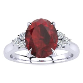 2 Carat Oval Shape Garnet and Diamond Ring In 14K White Gold
