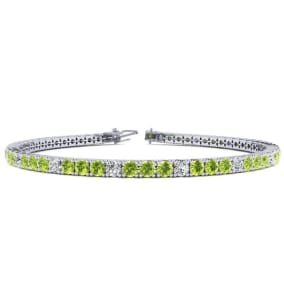 3 1/2 Carat Peridot And Diamond Alternating Tennis Bracelet In 14 Karat White Gold Available In 6-9 Inch Lengths