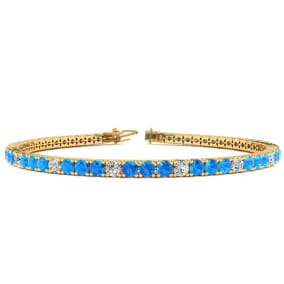4 1/3 Carat Blue Topaz And Diamond Alternating Tennis Bracelet In 14 Karat Yellow Gold Available In 6-9 Inch Lengths