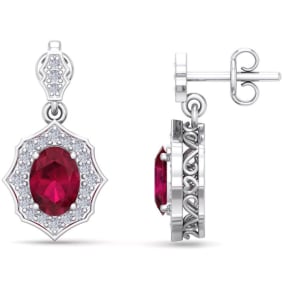 2 1/5 Carat Oval Shape Ruby and Diamond Dangle Earrings In 14 Karat White Gold