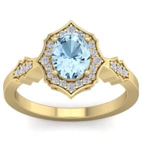 1 1/2 Carat Oval Shape Aquamarine and Diamond Ring In 14 Karat Yellow Gold