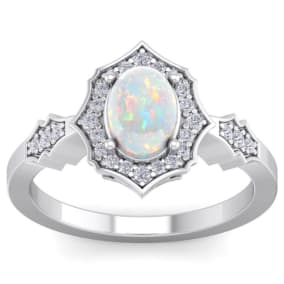 1 1/4 Carat Oval Shape Opal and Diamond Ring In 14 Karat White Gold