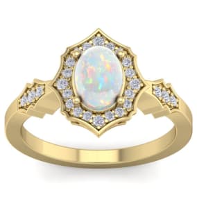 1 1/4 Carat Oval Shape Opal and Diamond Ring In 14 Karat Yellow Gold