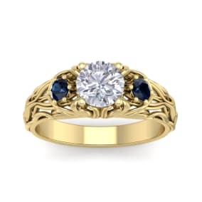 Moissanite Engagement Ring; 1 1/4 Carat Round Shape Moissanite and Sapphire Intricate Vine Engagement Ring In 14 Karat Yellow Gold