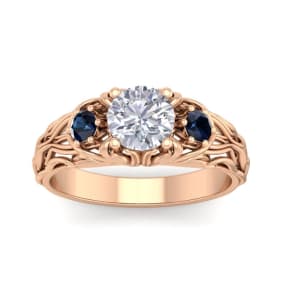 Moissanite Engagement Ring; 1 1/4 Carat Round Shape Moissanite and Sapphire Intricate Vine Engagement Ring In 14 Karat Rose Gold